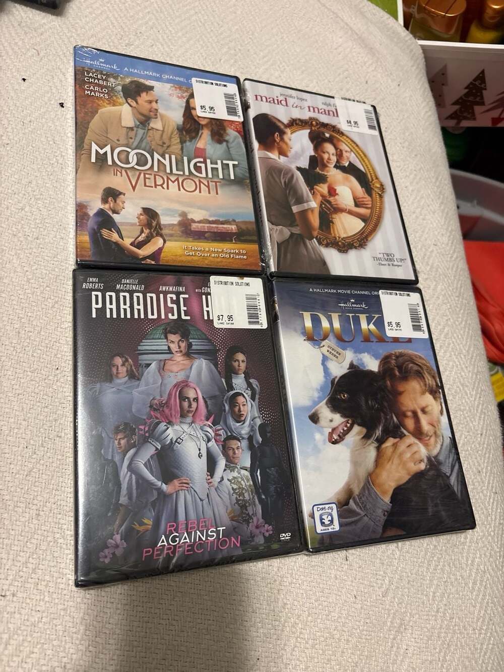 Sealed DVDs: Moonlight in Vermont, Maid in Manhattan, Paradise Hills, Duke